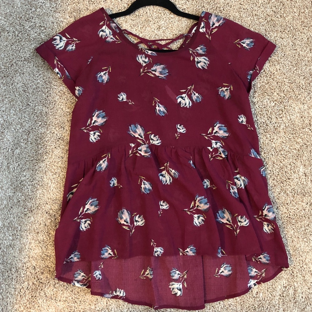Peplum top with lace up back detail